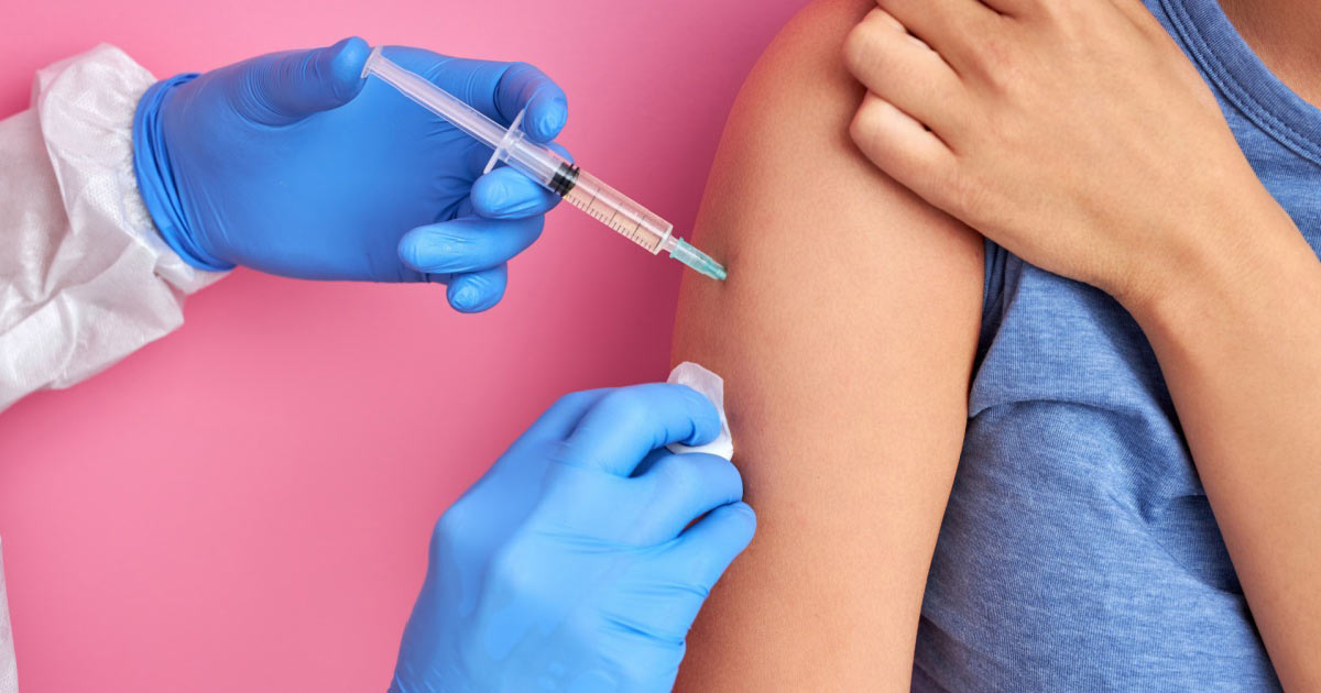 Image of a woman receiving an injection