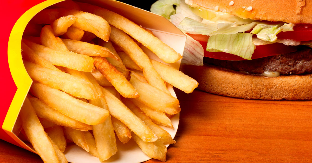 Close-up of a burger and chips. 