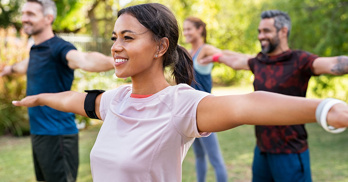 People outdoors doing exercise.