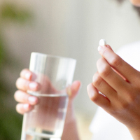 Having pill with water